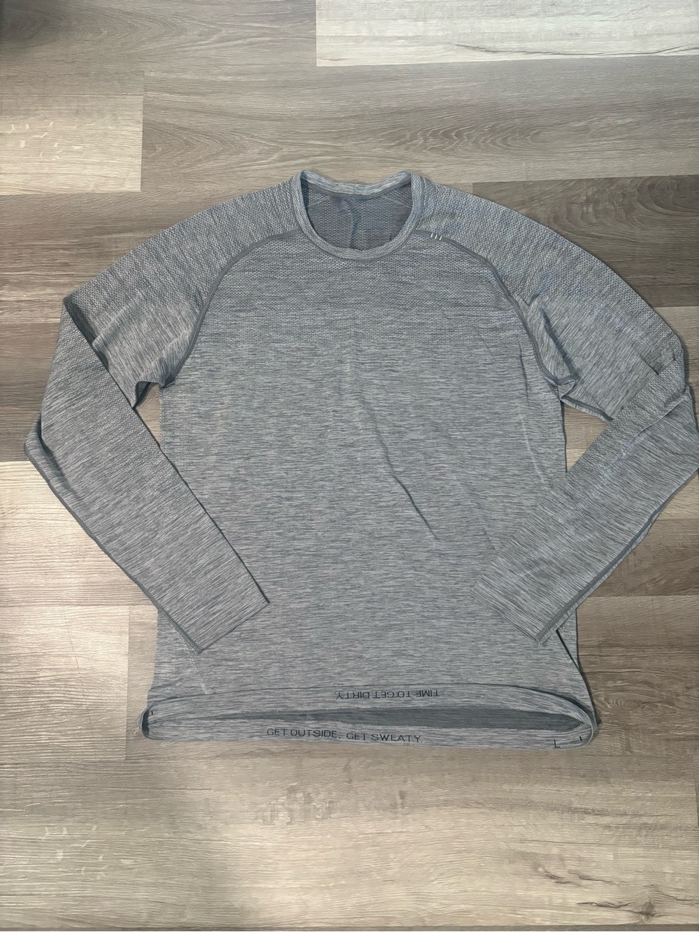 Men's Lululemon Heather Gray long sleeve moisture wicking fabric. Men’s large.